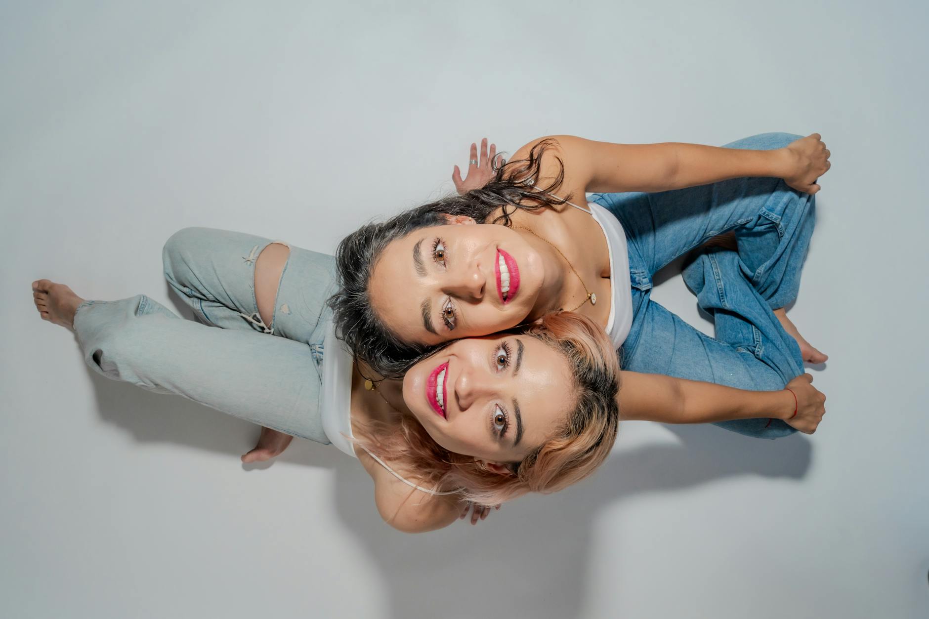 aerial portrait of two women in close embrace